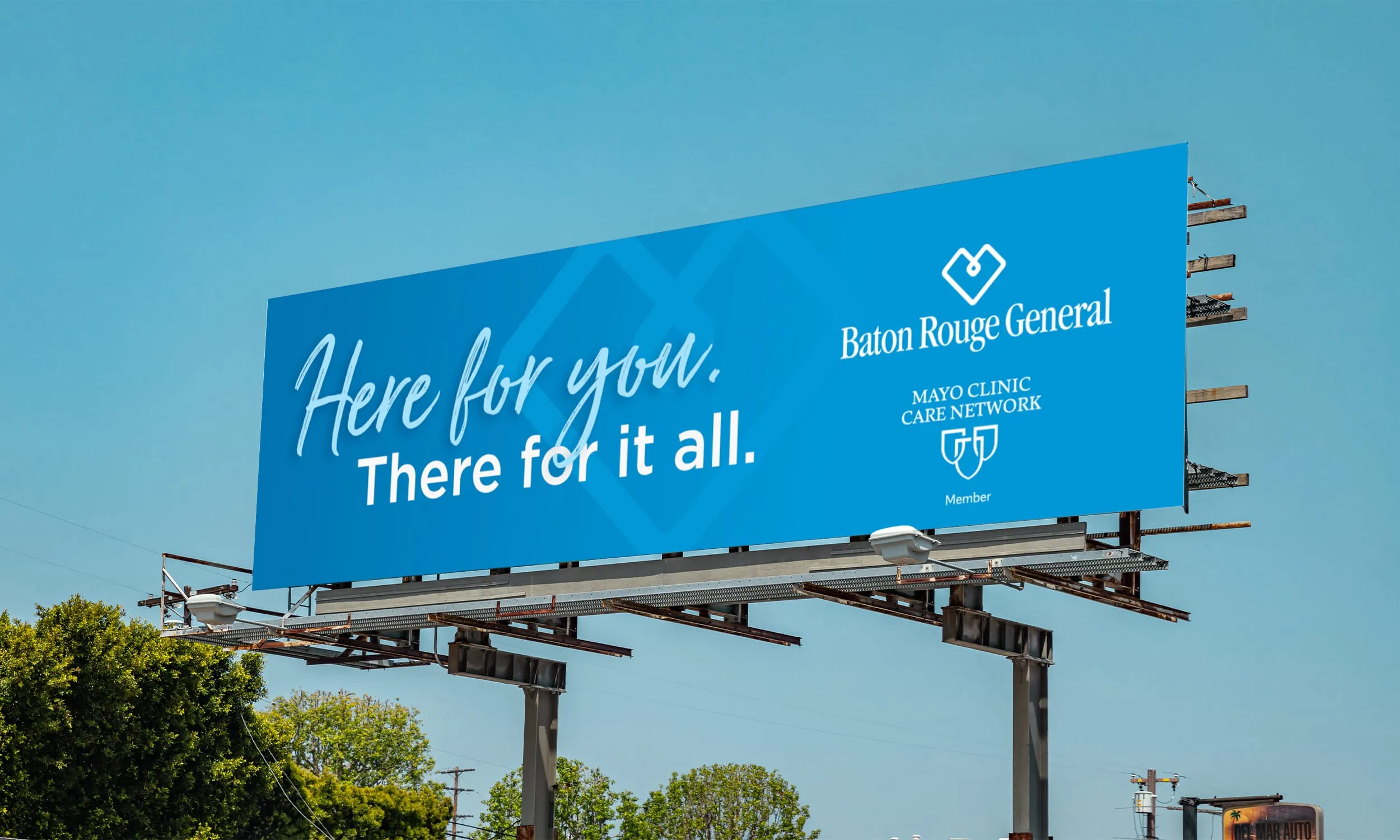 A Baton Rouge General billboard reading Here for You. There for It All.