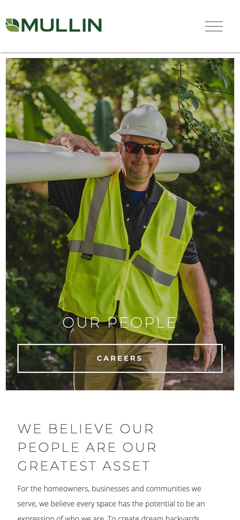 A phone showing the Mullin careers page featuring a worker in a safety vest