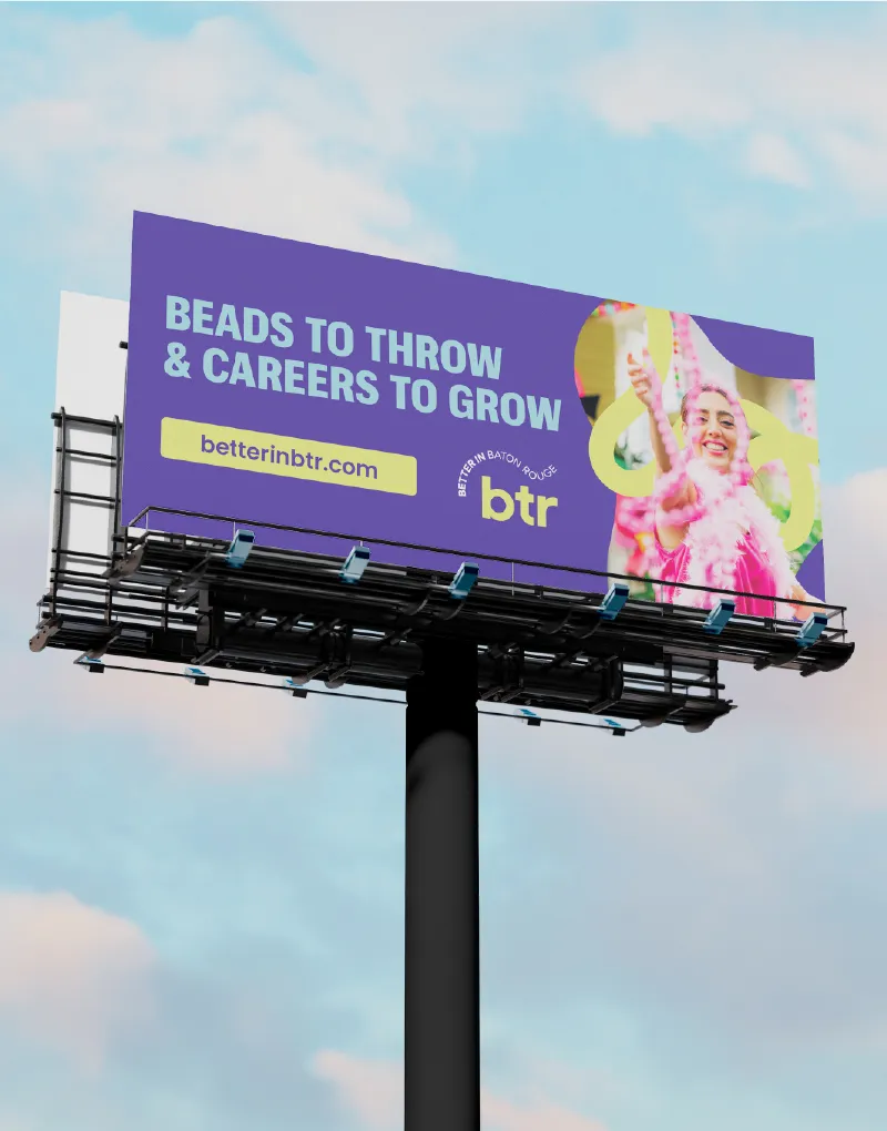 A Better in BTR billboard reading Beads to Throw and Careers to Grow