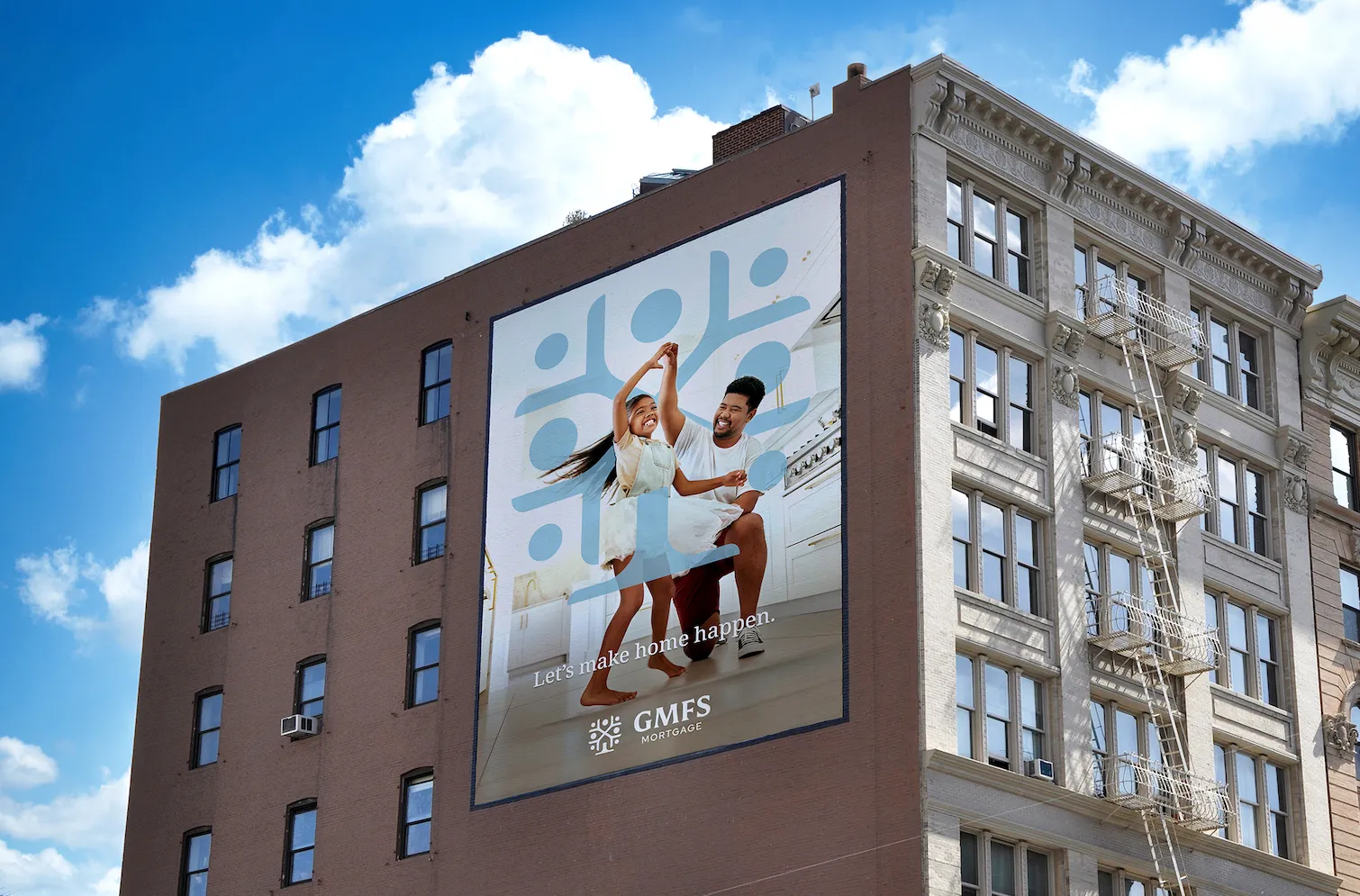 A GMFS mural advertisement on the side of a brick building