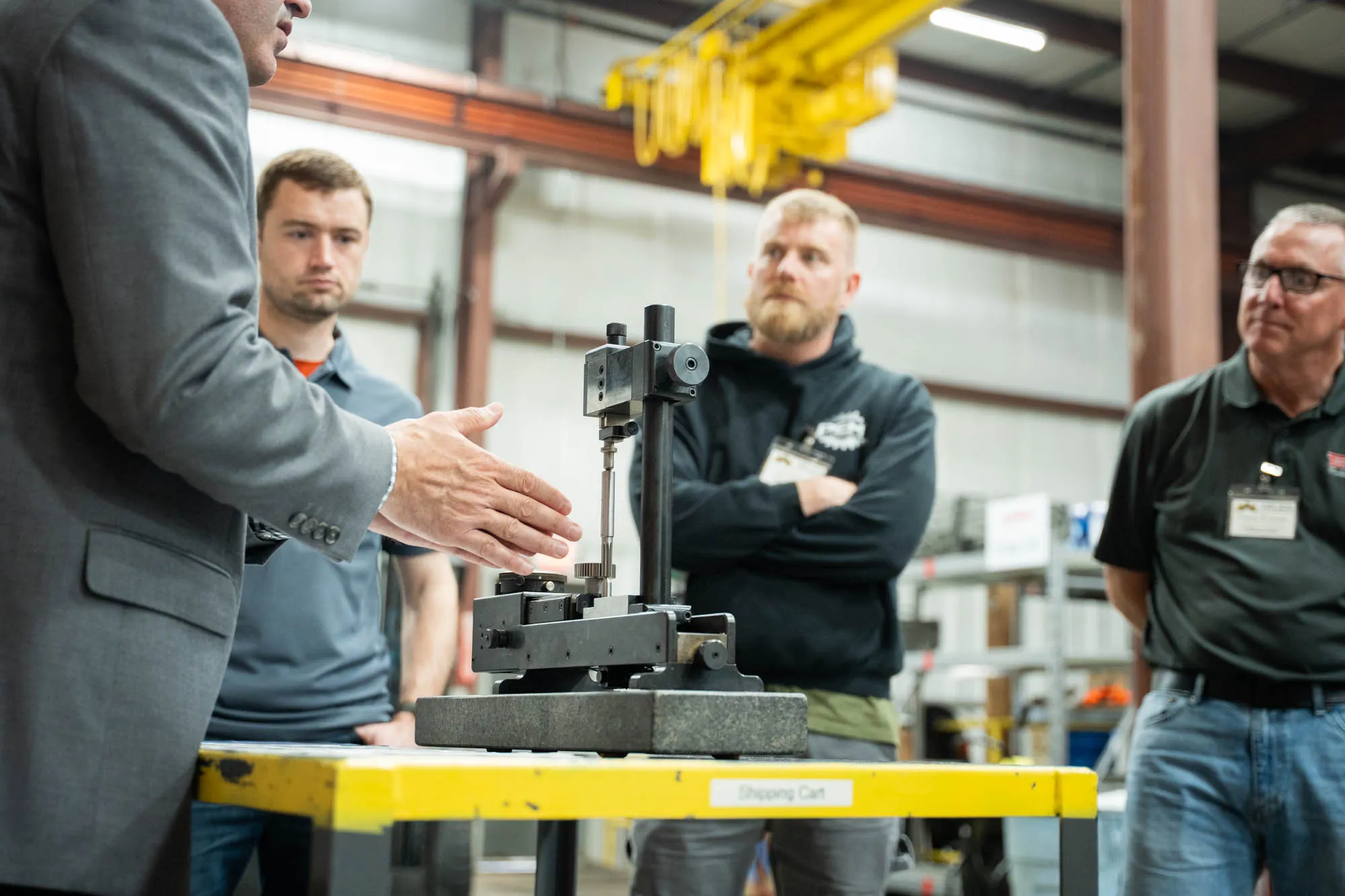 Instructor leading a Helios Gear School gear inspection session