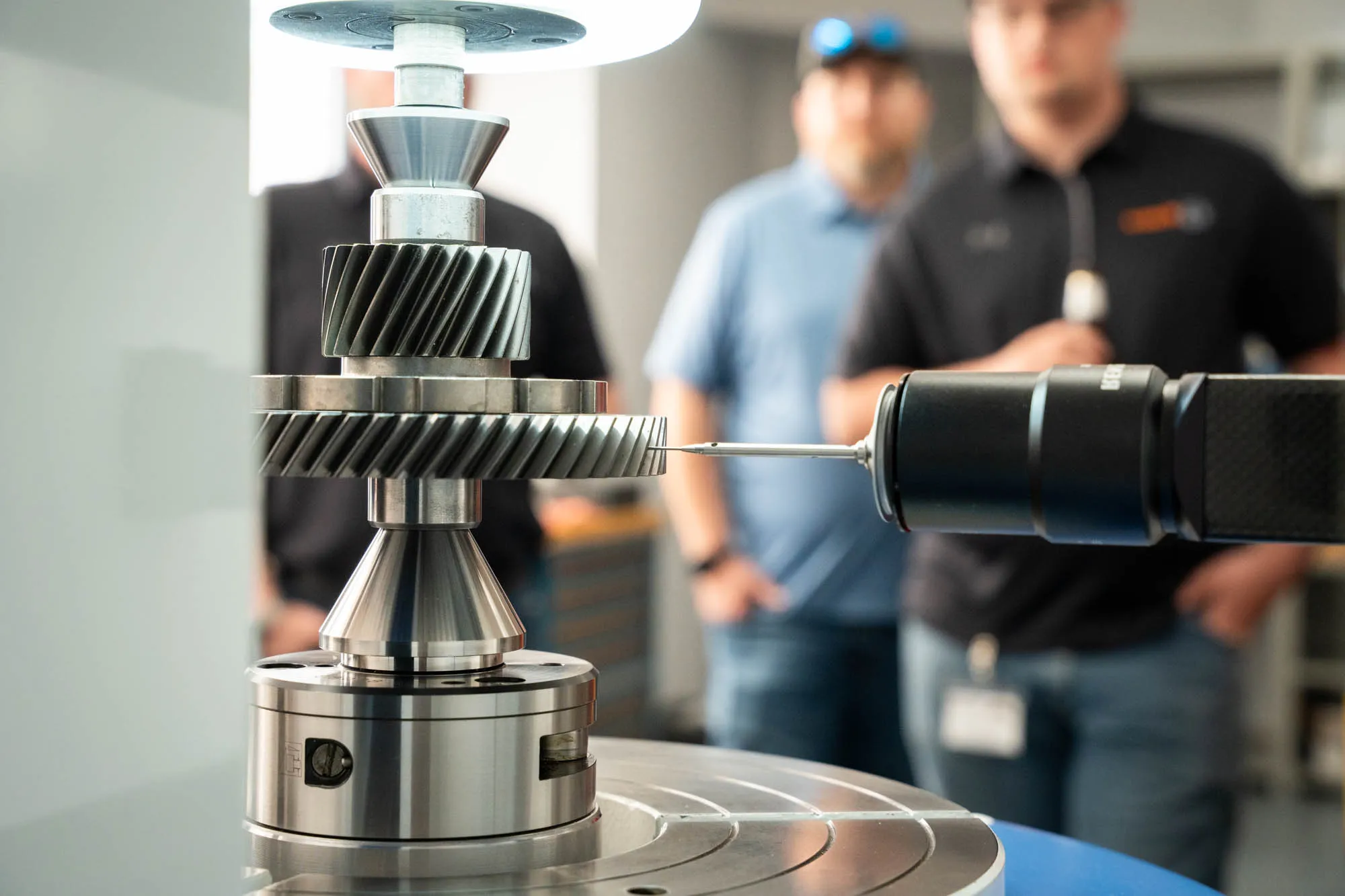 Helical gear on an inspection machine probe during a Helios Gear School demonstration