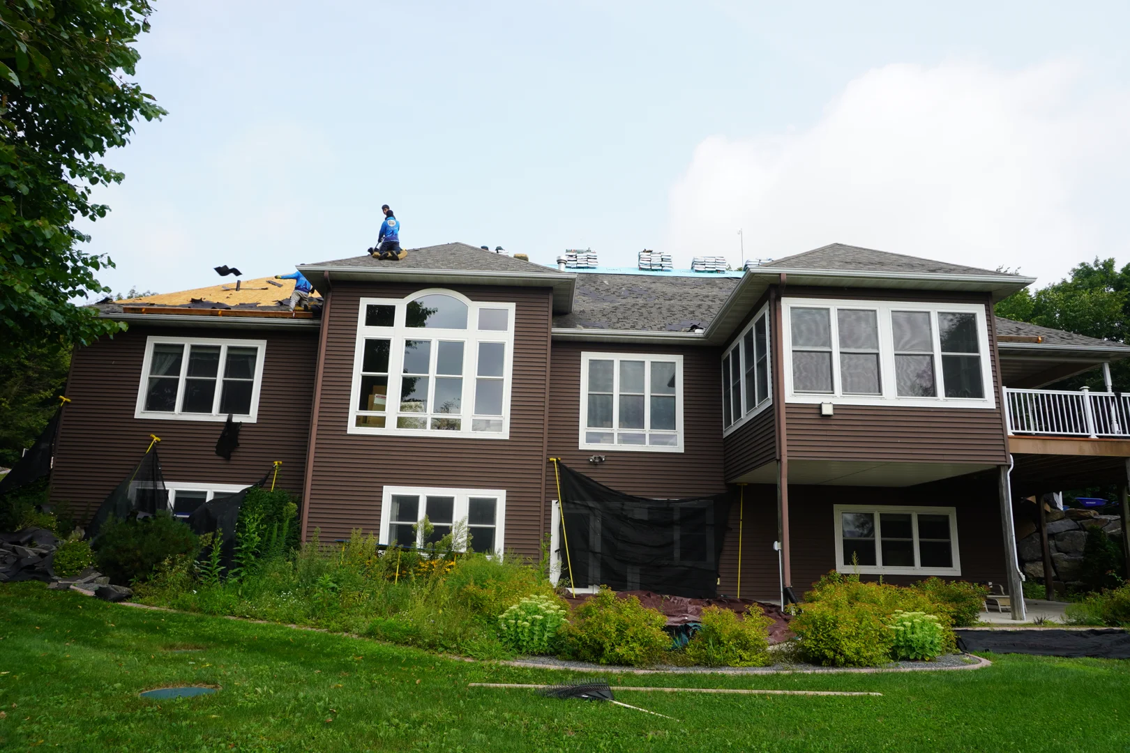 Residential home with a newly installed asphalt shingle roof in Weston WI Residential home with a newly installed asphalt shingle roof in Weston WI