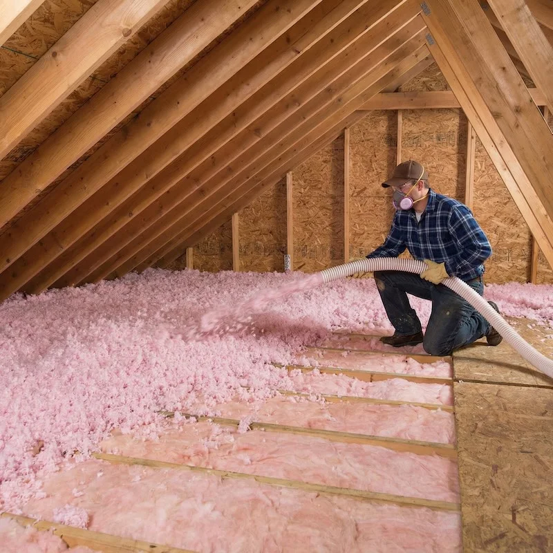 home with proper attic insulation and clean gutters in winter home with proper attic insulation and clean gutters in winter