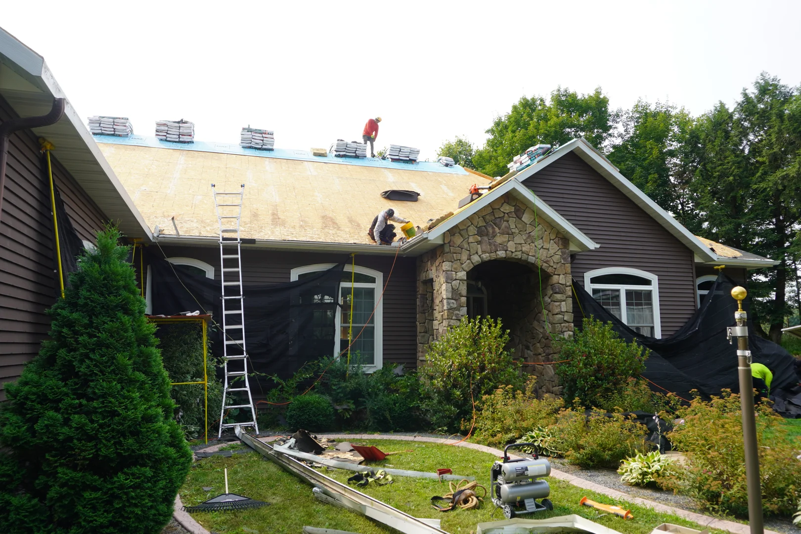architectural shingles being installed on a Wausau home architectural shingles being installed on a Wausau home