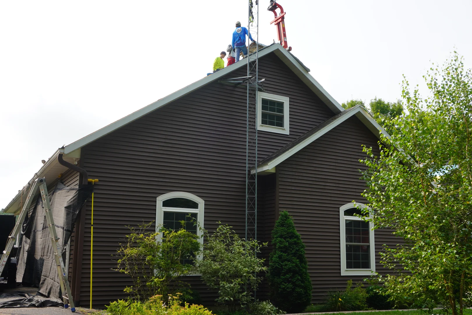 A-RITE Exteriors crew working on a roof replacement on a Central Wisconsin home