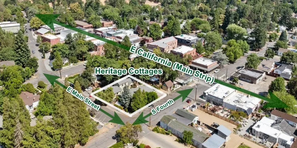 Aerial view of Heritage Cottages at the corner of E Main Street and S Fourth Street in downtown Jacksonville, Oregon