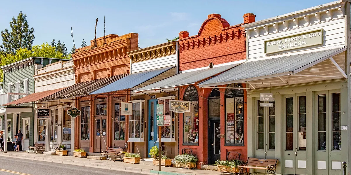 Historic Main Street in downtown Jacksonville, Oregon, lined with 19th-century storefronts