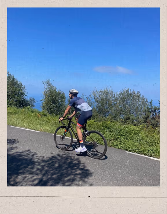 Dylan Gambardella, co-founder at Different Health, riding a bike