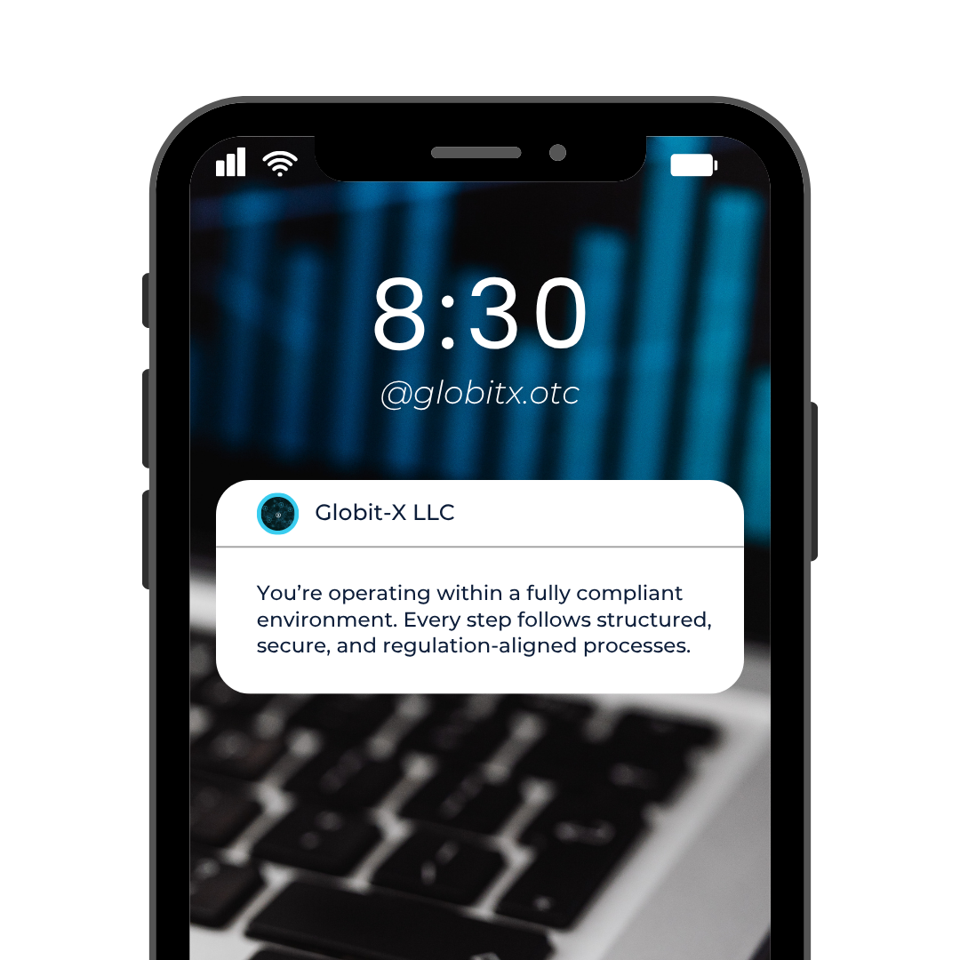 Smartphone screen showing time 8:30 with a notification from Globit-X LLC about operating in a fully compliant, secure, and regulation-aligned environment, with a blurred laptop keyboard background.