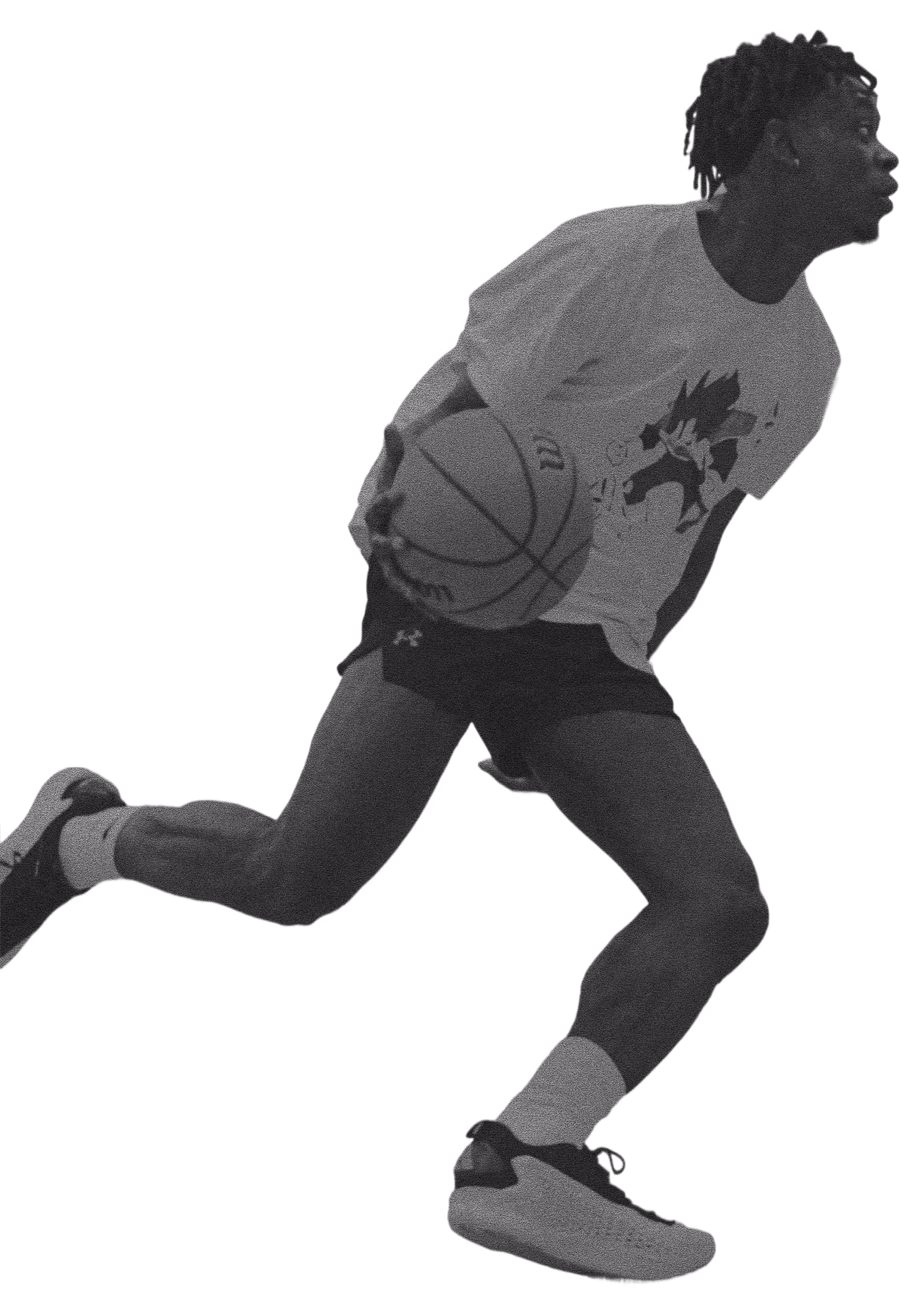 Athlete dribbling a basketball, wearing shorts, a graphic t-shirt, and sneakers in motion.
