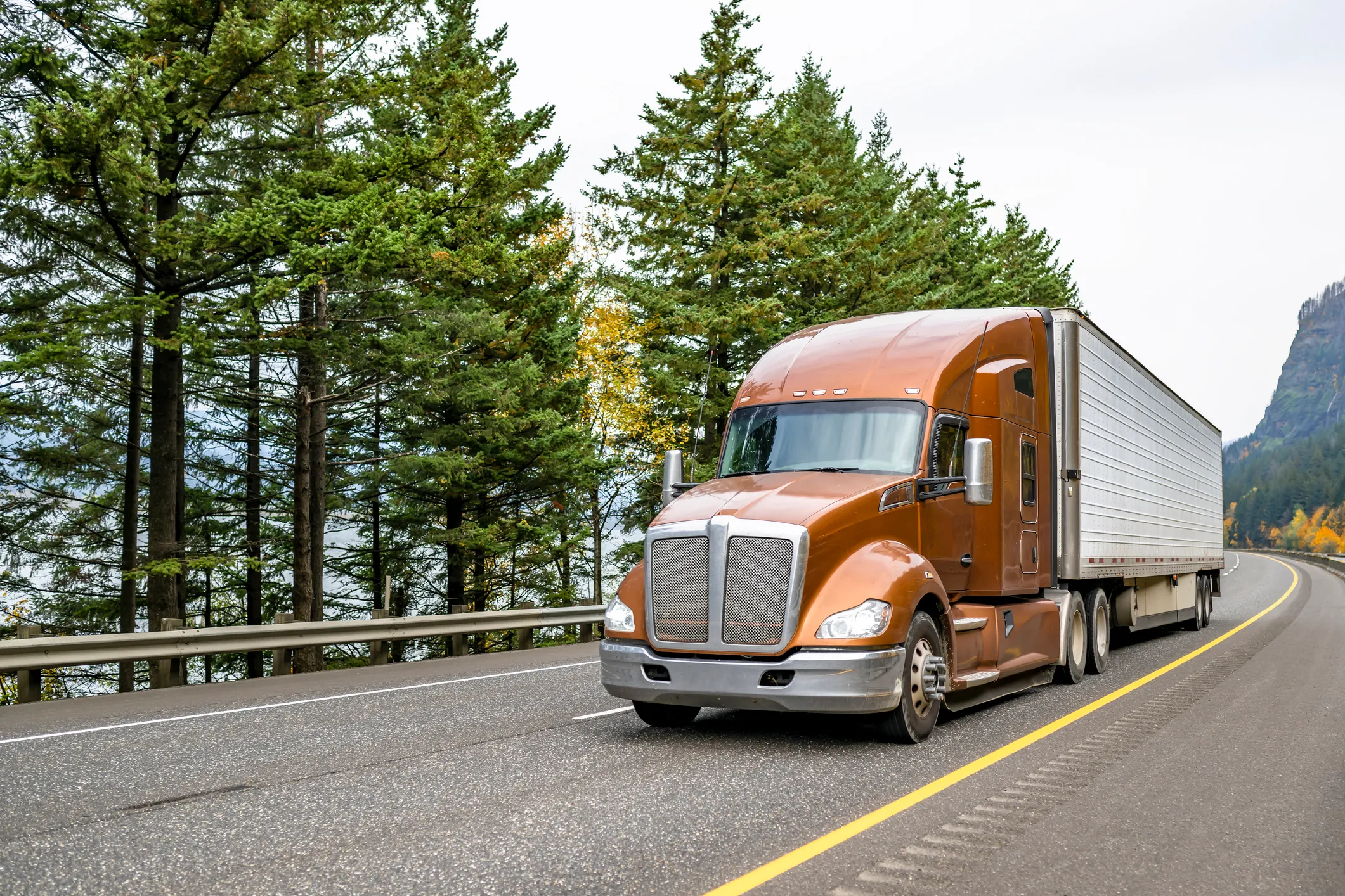 Semi-truck hauling a trailer on a highway — wrongful death trucking liability case result
