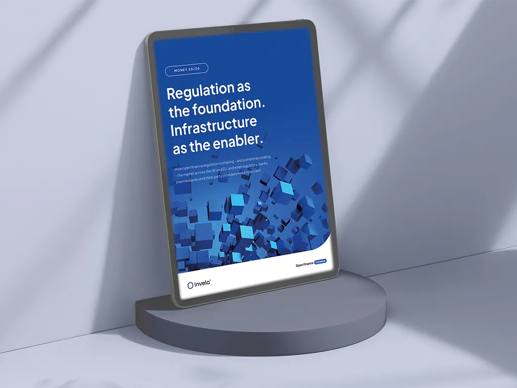 Tablet showing a report titled 'Regulation as the foundation. Infrastructure as the enabler' with blue digital cubes.