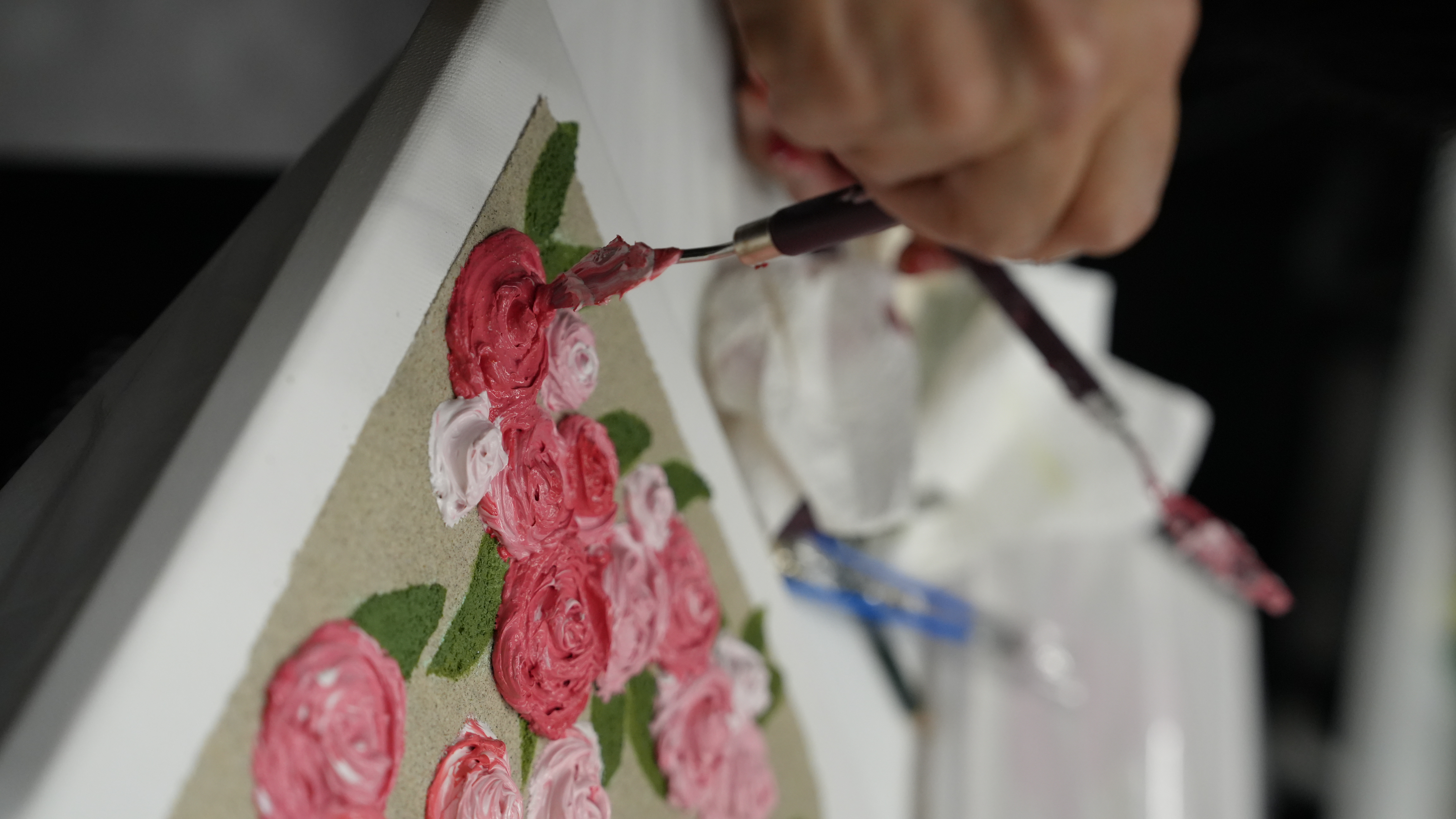 Palette knife applying textured acrylic rosettes for Textured Art Styling course at The Second Studio