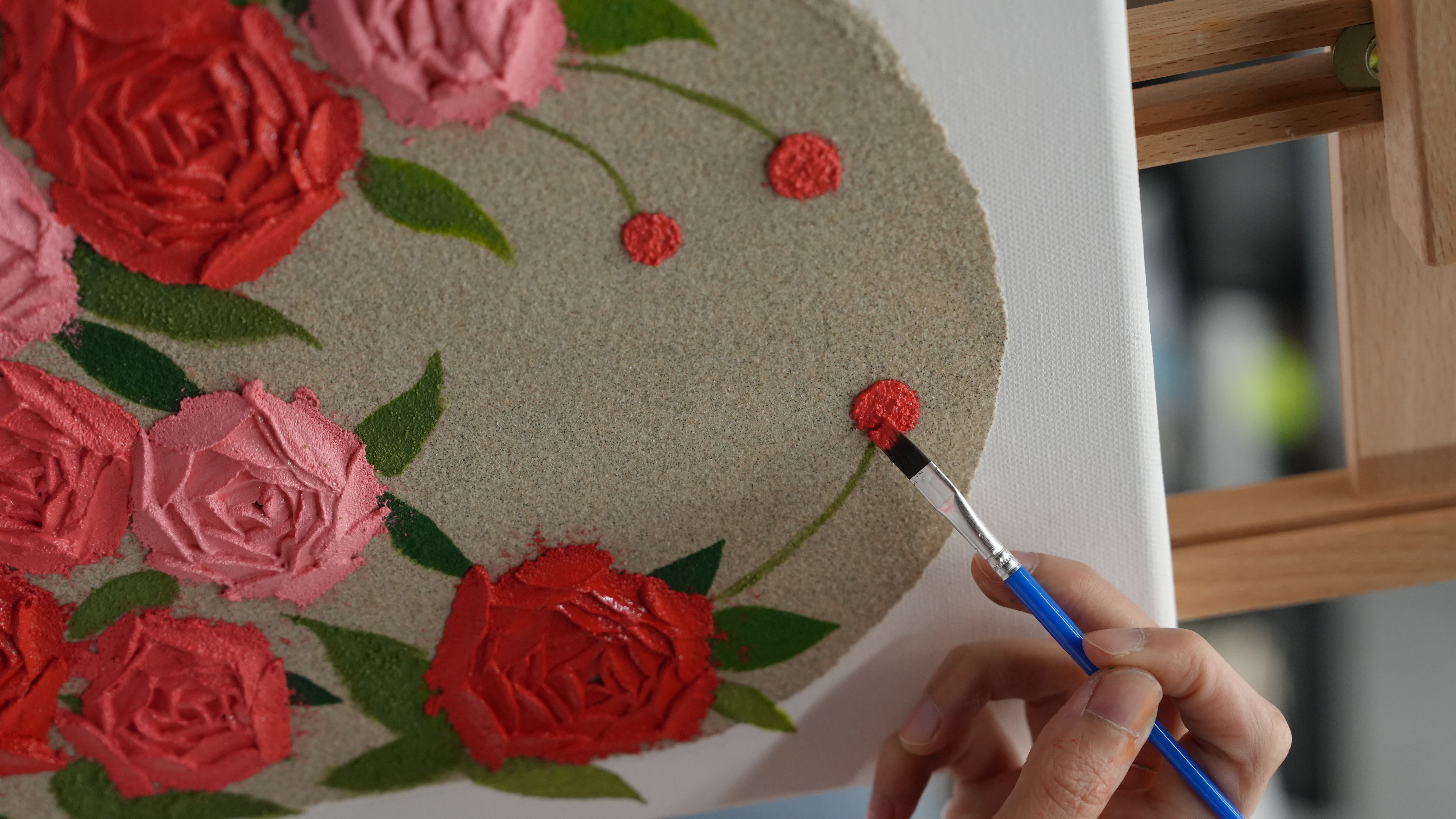 Brush detail work on textured acrylic rose canvas