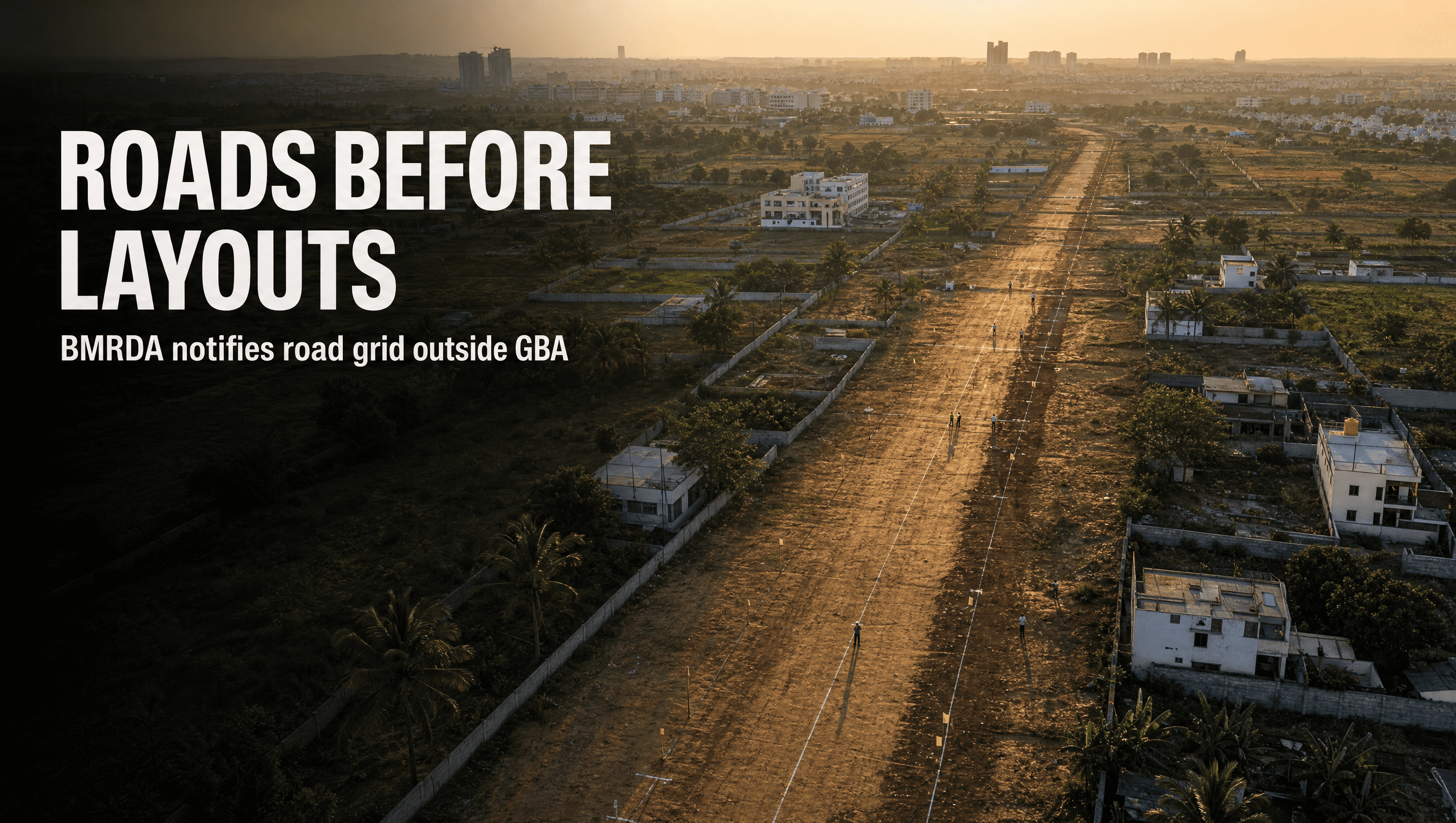 Aerial view of a planned road corridor cutting through layouts on Bengaluru's outskirts