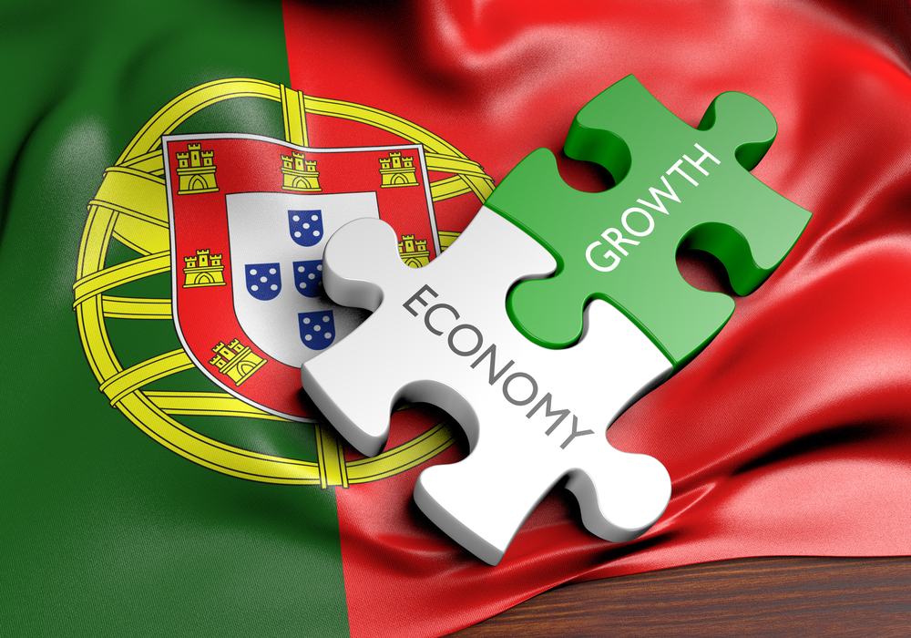 Portugal flag backdrop connects 'Economy' and 'Growth' puzzle pieces, illustrating national economic strategy