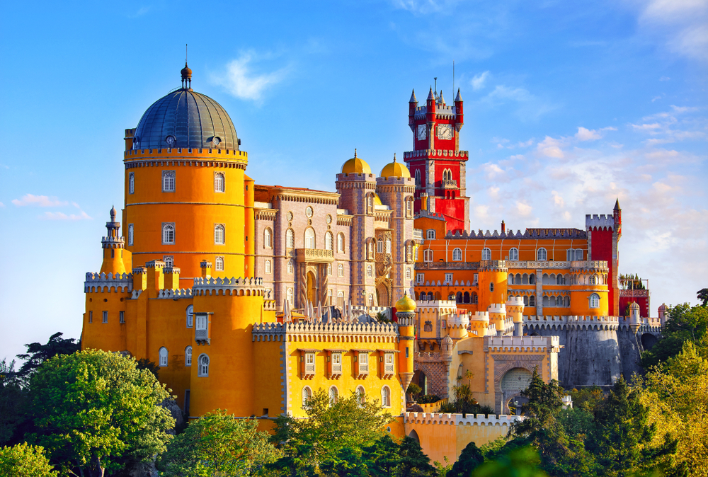 Sunshine and blue skies over the famous landmark of the Palace of Pena in Sintra