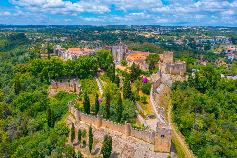 Convent of Christ and Tomar castle in on a green hillside
