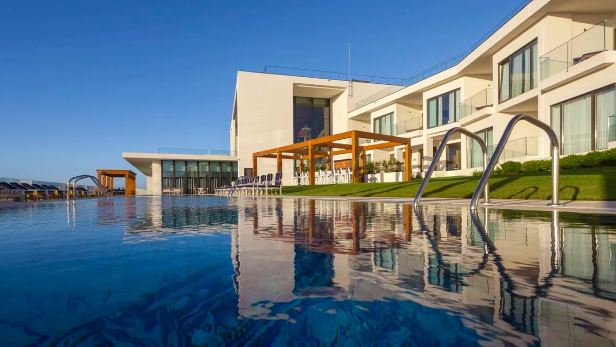 Modern Evolutee Hotel at Royal Óbidos with a large outdoor infinity pool