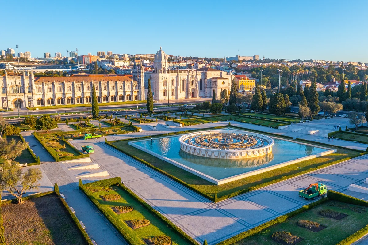 Aerial view of Jerónimos Monastery and the grand fountain at Praça do Império in Lisbon