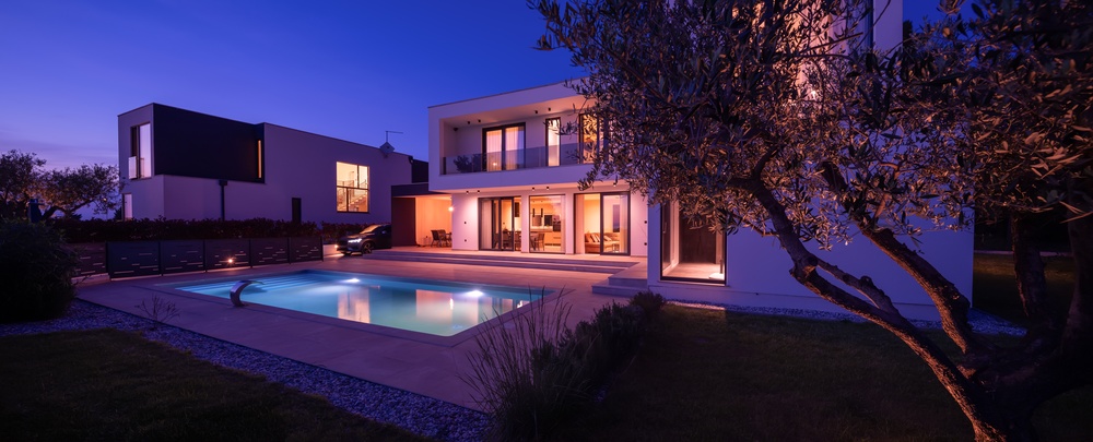 Exterior of modern luxury new home in Portugal with swimming pool