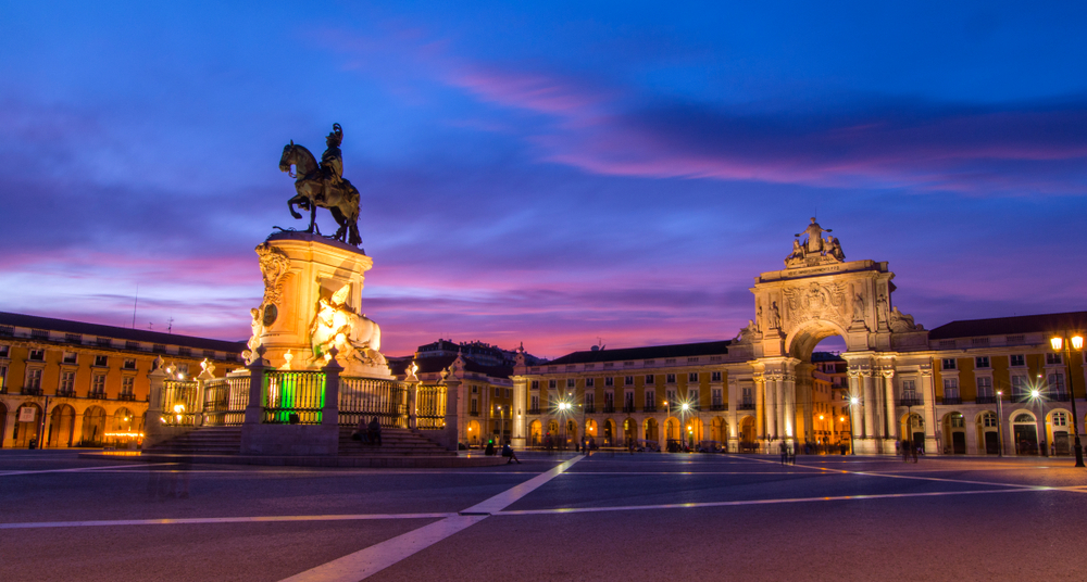 Lisbon at dusk with iconic landmark