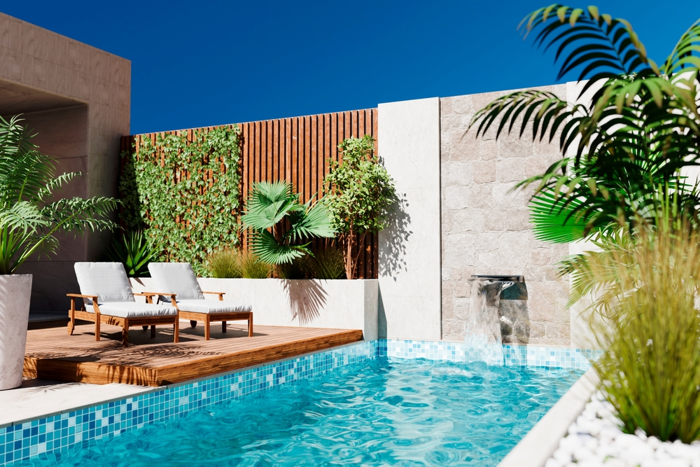 Pool and seating area outside of luxury new villa in Portugal