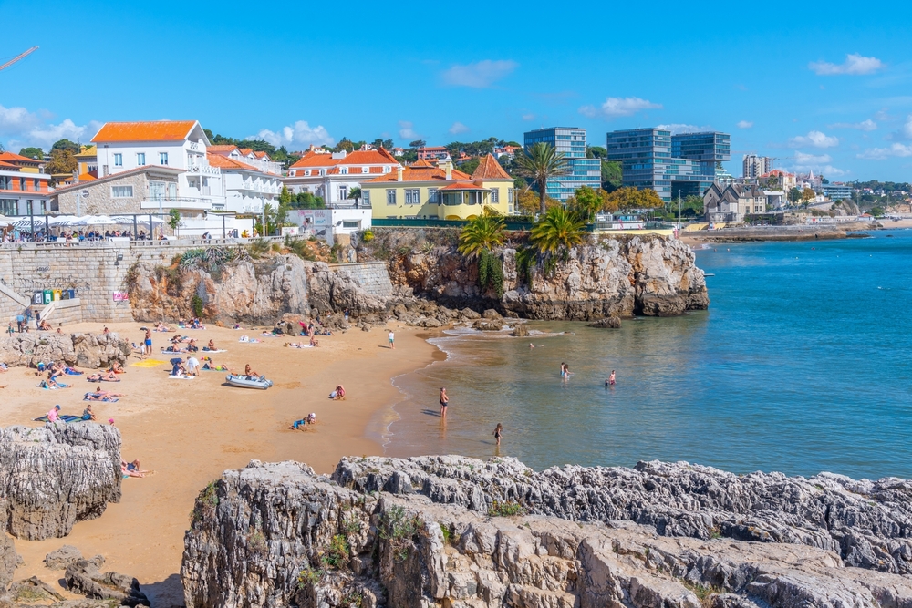 Coastal view of Portugal illustrating residency and family planning benefits.