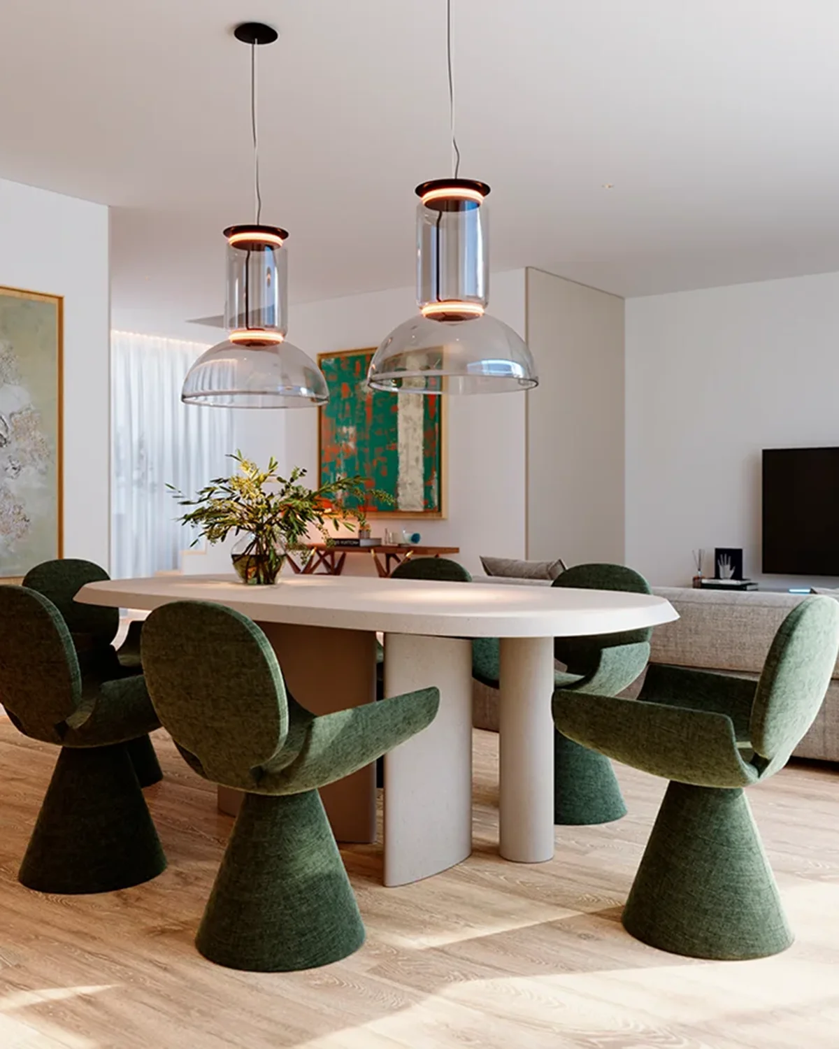 Luxury dining area in Ocean 7 development with modern lighting and green upholstered chairs.
