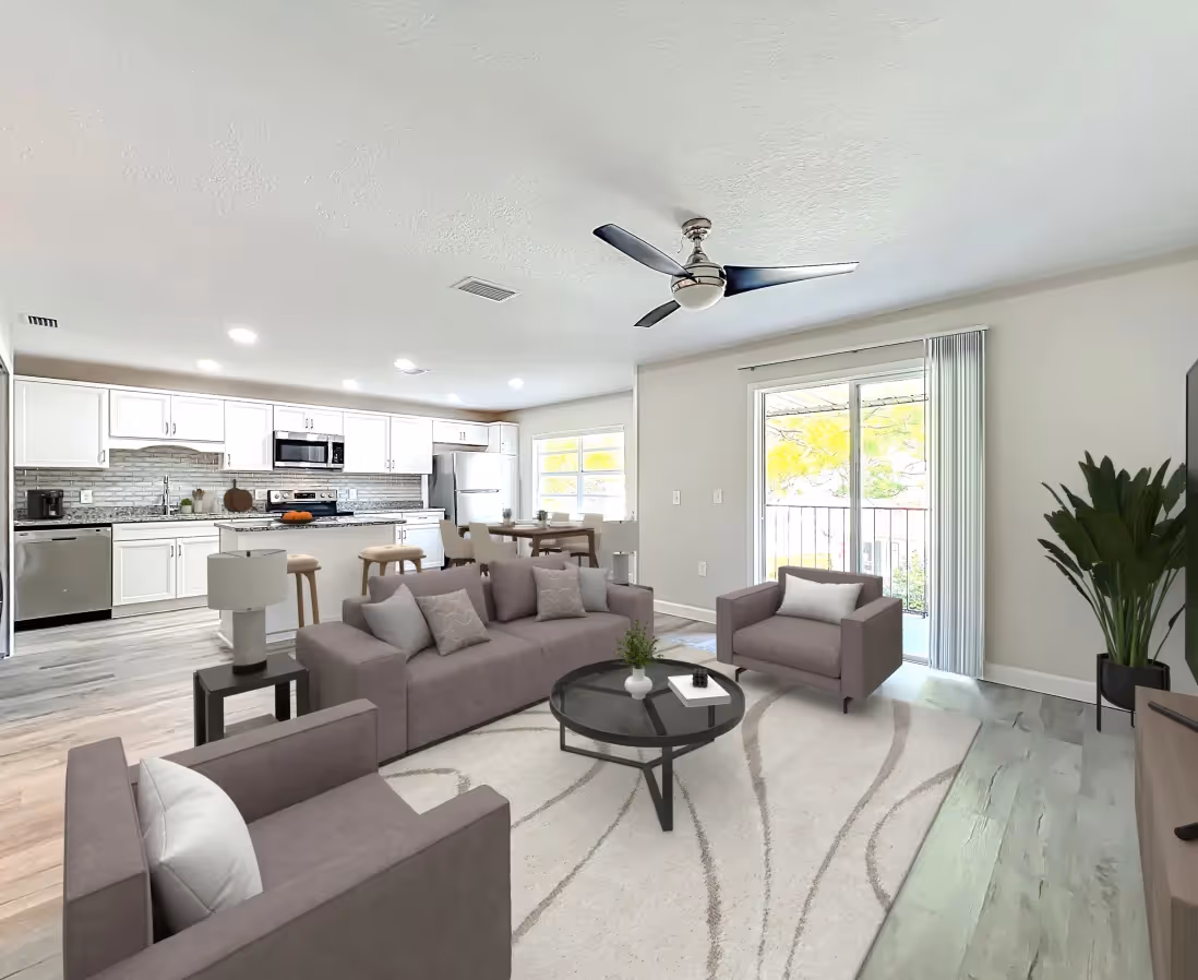 Living area with virtually staged sofa, coffee table, and chairs