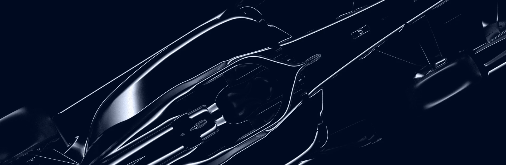 Top-down view of a sleek black Formula 1 race car cockpit and aerodynamic body.