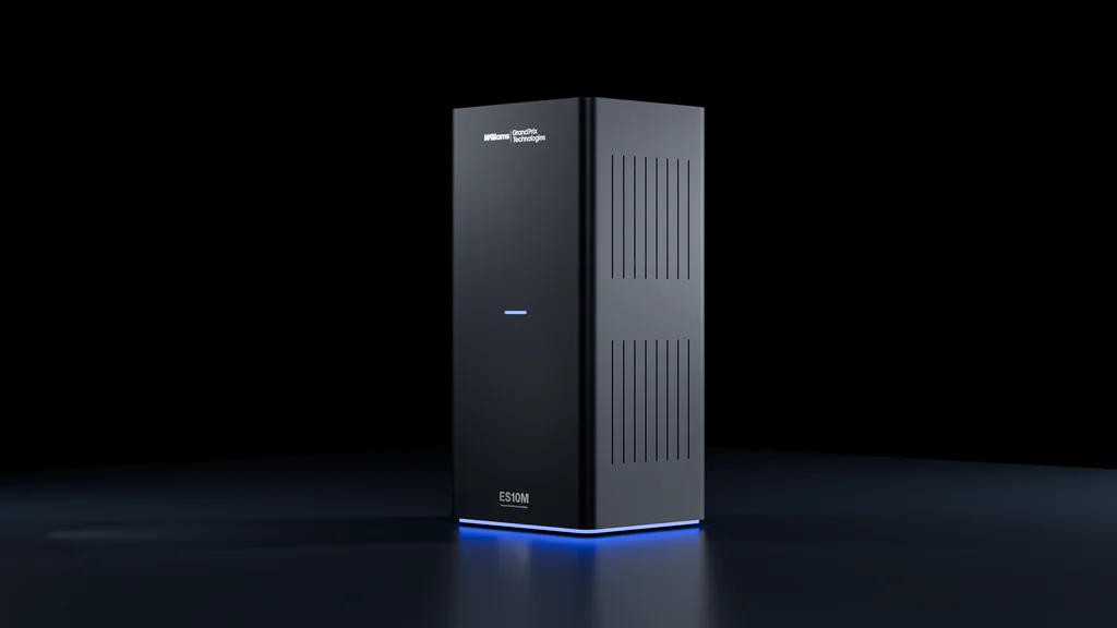 Tall black rectangular technology device labeled Williams GrandPrix Technologies ES10M with blue edge lighting.