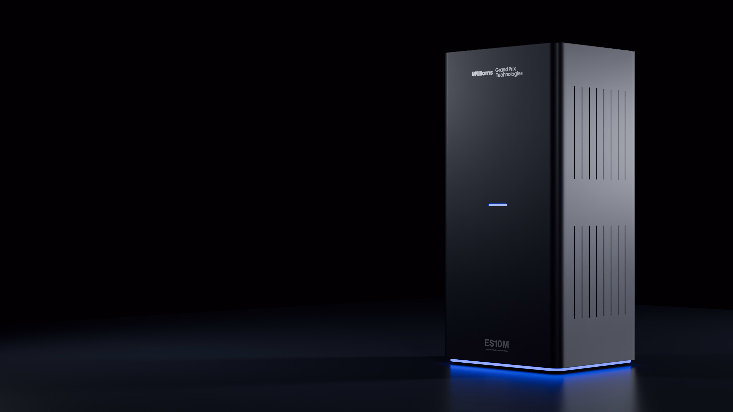 Black gaming PC tower with blue LED lighting and Williams Grand Prix Technologies logo.