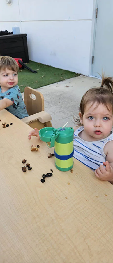 toddlers enjoy snack time in nurturing environment at palm beach gardens preschool florida