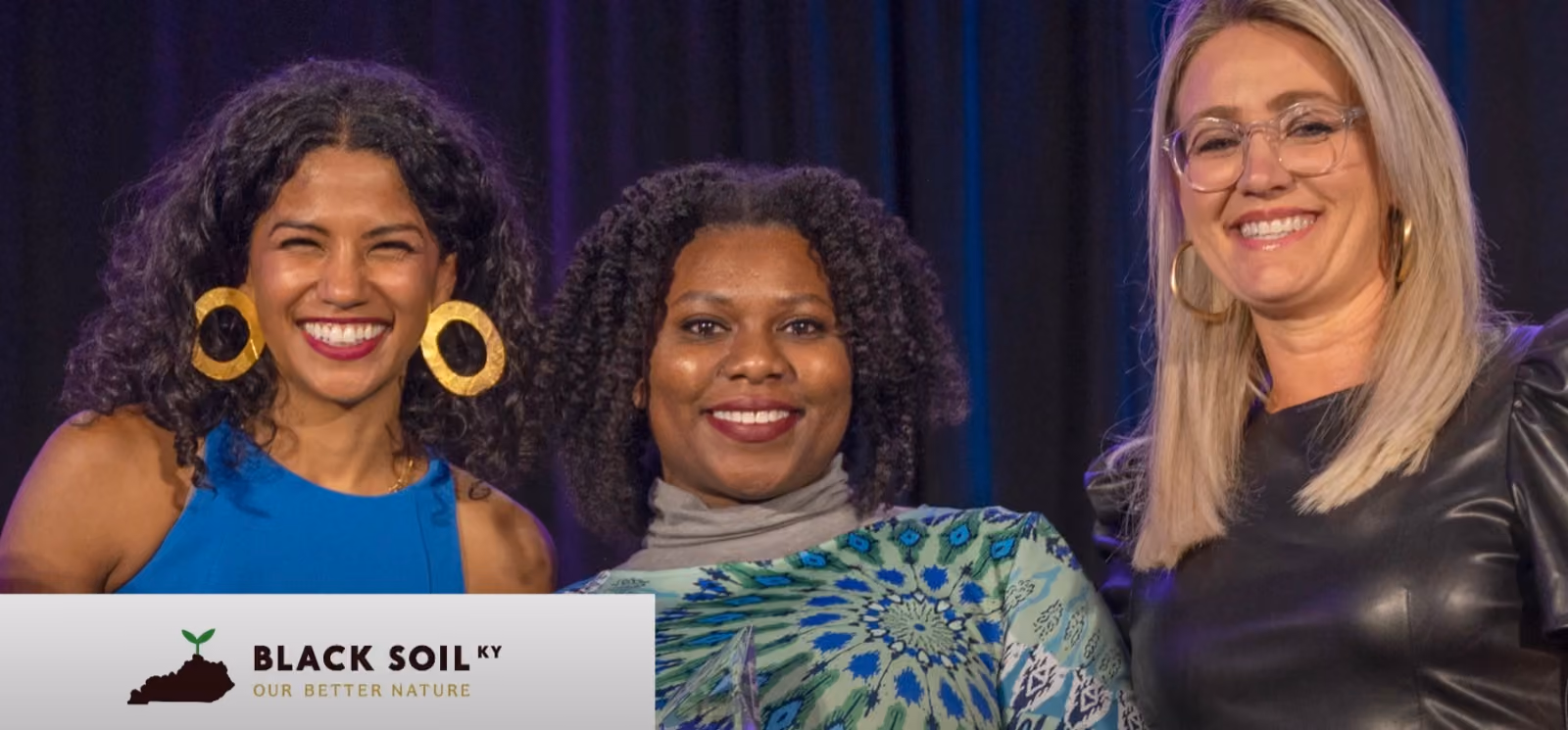 Black Soil KY accepting the Social Impact award