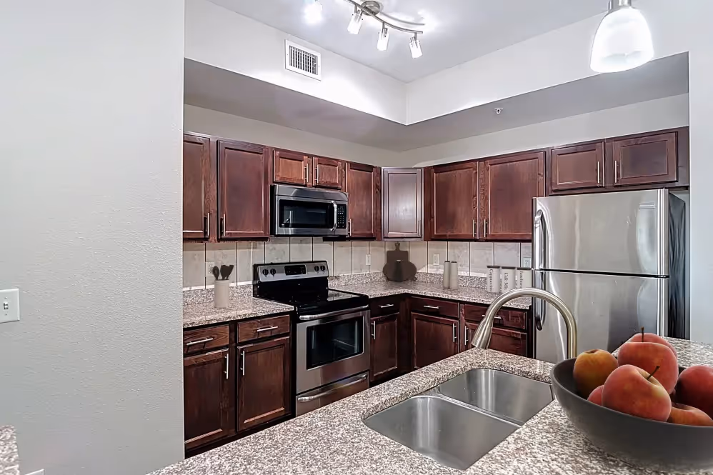 Kitchen with brown cabinets