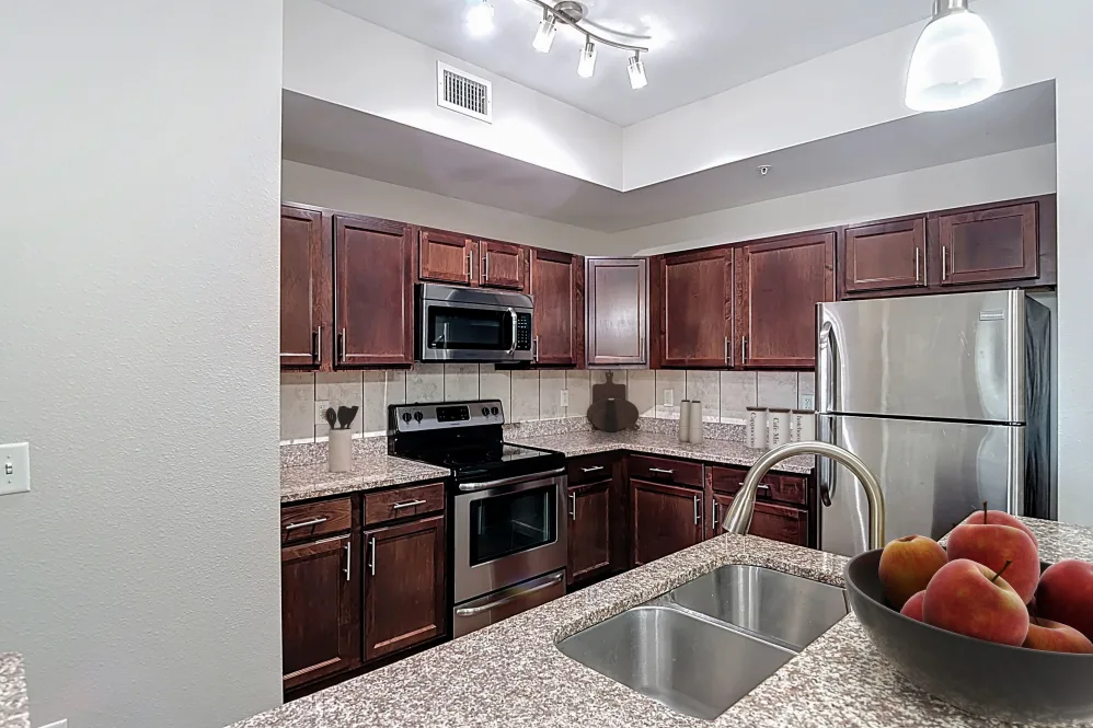 Kitchen with brown cabinets