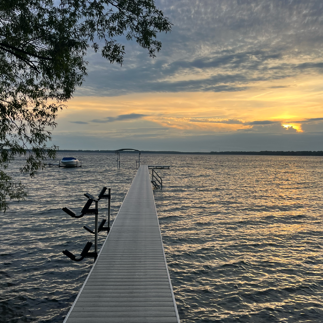 Wooden dock on a West Michigan lake at sunset