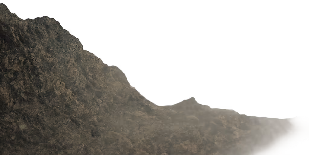 Rugged mountain ridge disappearing into mist with a rocky texture.