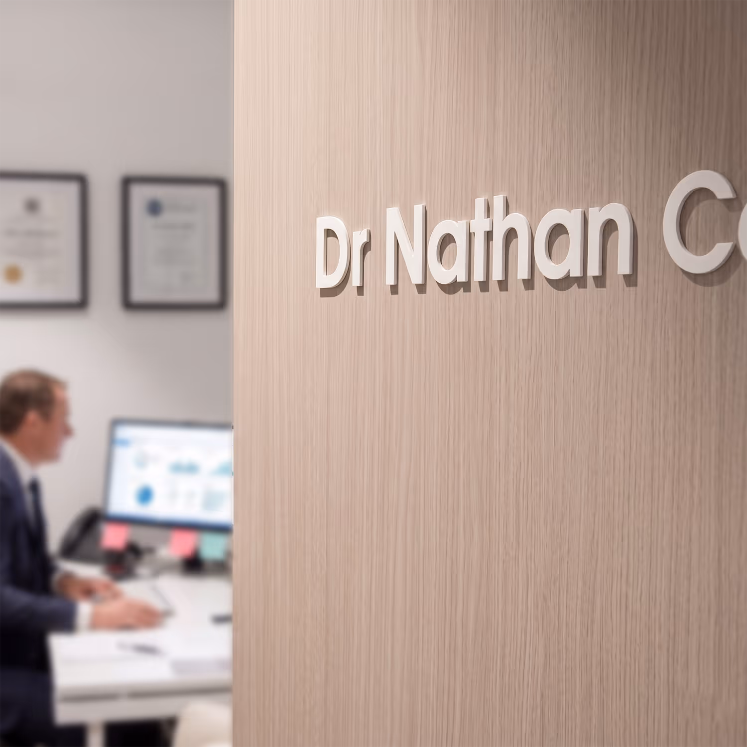 A close up image of the Dr Nathan Connelly’s office door during a consultation.