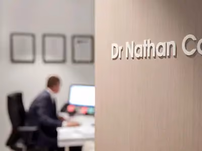 A close up image of the Dr Nathan Connelly's office door during a consultation.