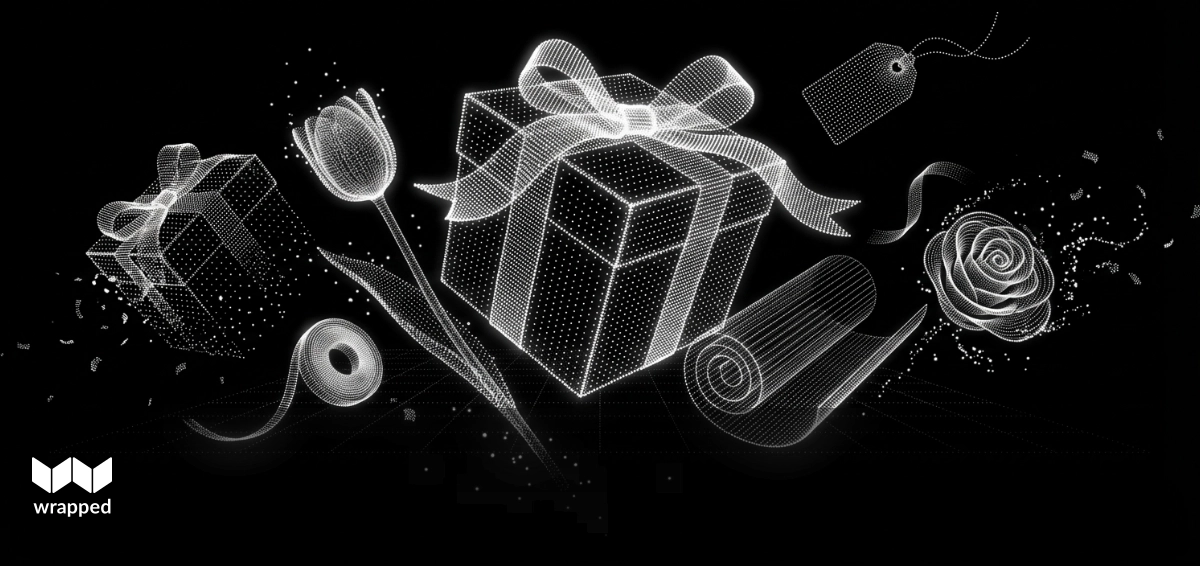 A neatly wrapped clothing gift box with a handwritten note tucked inside, sitting on a table in warm light