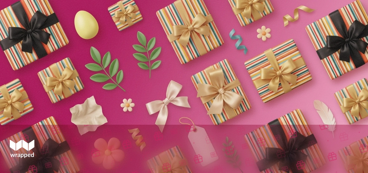 Spring flowers and wrapped gifts on a table with Easter eggs and a card for Mom nearby