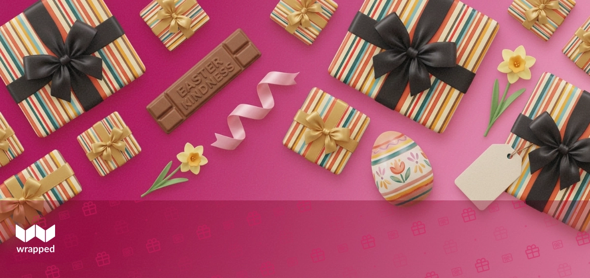 Chocolate eggs and wrapped Easter gifts surrounded by spring flowers on a family table