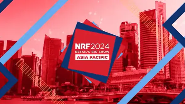 City skyline with modern tall buildings in red tones and overlapping blue and red geometric shapes featuring the text 'NRF 2024 Retail's Big Show Asia Pacific'.