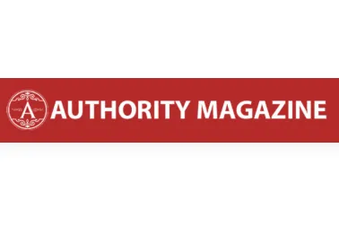 Authority Magazine logo with a circular emblem on the left containing the letter A and decorative elements, and the text 'AUTHORITY MAGAZINE' in bold white letters on a red background.