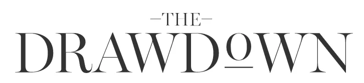 Stylized text logo reading 'THE DRAWDOWN' with a line above and below the word THE.