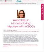 Magazine or article page titled 'Wearables in Manufacturing: Interview with AGCO's' featuring a headshot of a woman with glasses and shoulder-length hair above the title. The page includes text discussing the topic of wearables in manufacturing.