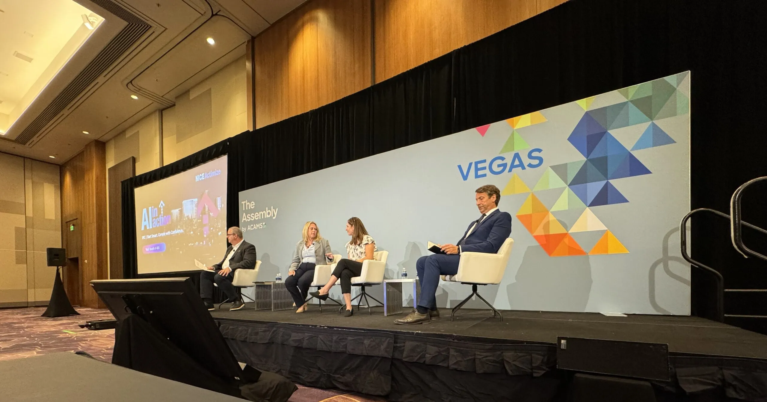 Experts from Microsoft, TCS, Truist, and SymphonyAI on stage at ACAMS Las Vegas 2024, discussing AI solutions for financial crime.